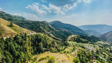 scenic landscape filled with green mountains in chakrata