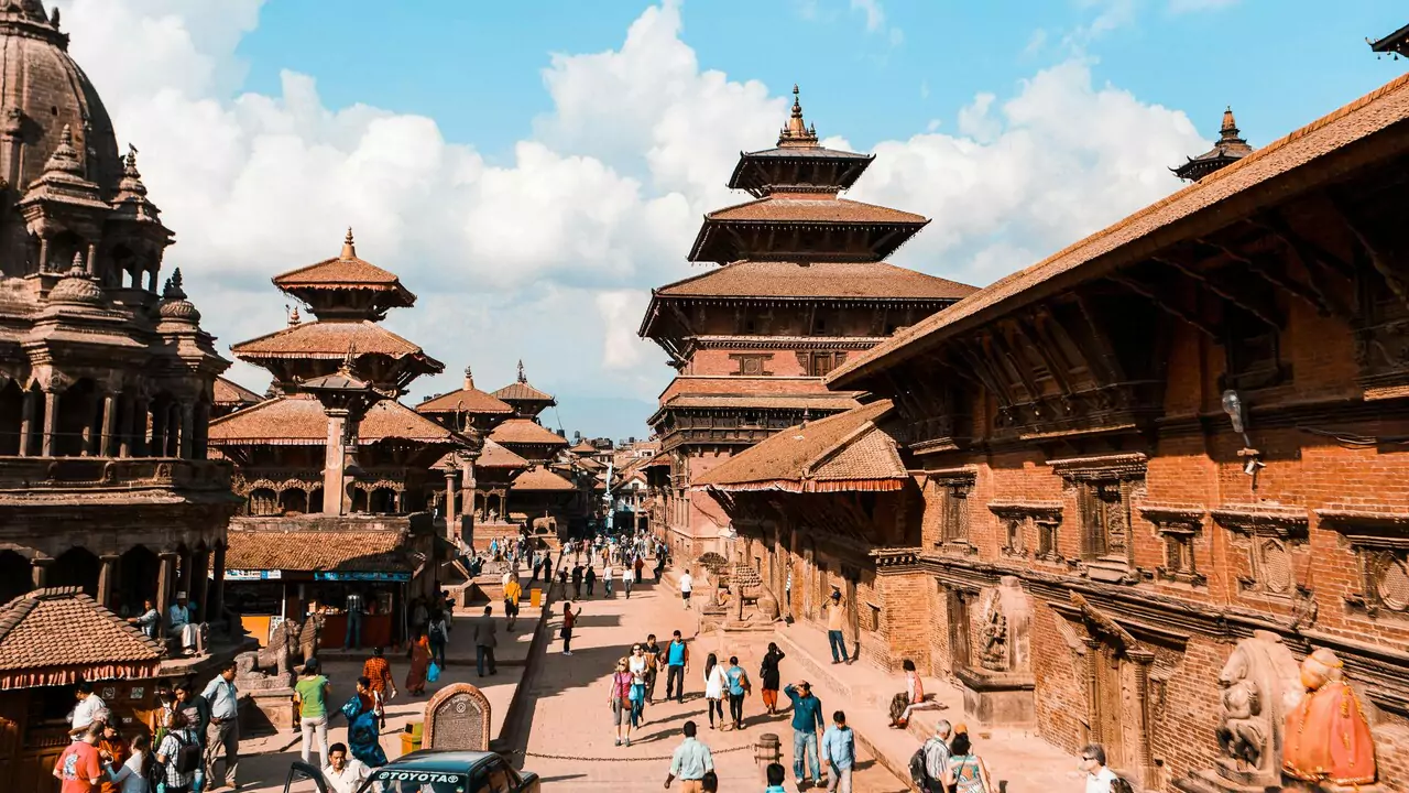 A scenic view of Kathmandu, Nepal, showcasing its vibrant culture and stunning architecture against a mountainous backdrop.