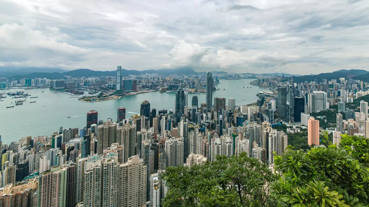 Hong Kong's scenic skyline, highlighting its iconic skyscrapers and the busy harbor.