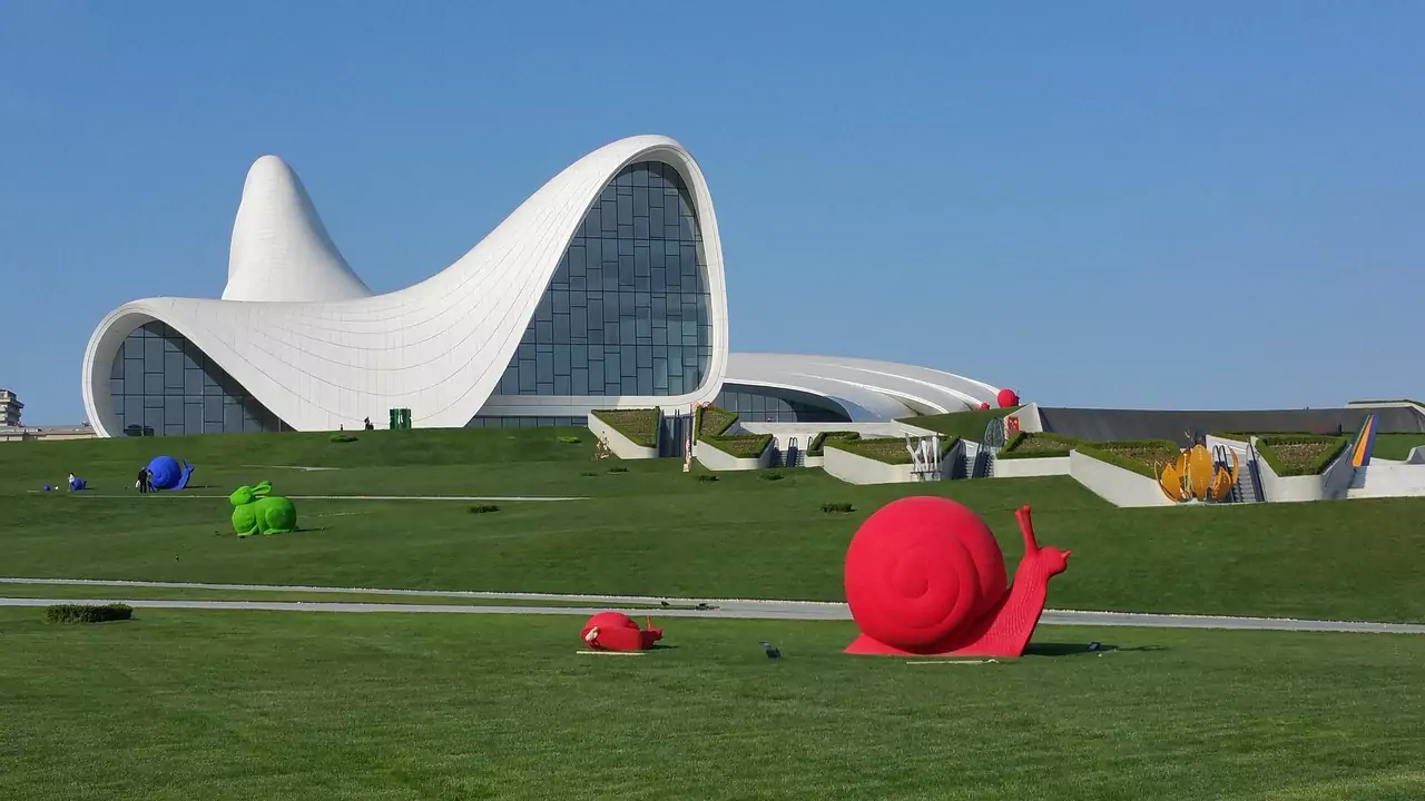 Heydar Aliyev Centre with a large snail sculpture displayed prominently outside.