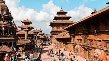 A scenic view of Kathmandu, Nepal, showcasing its vibrant culture and stunning architecture against a mountainous backdrop.