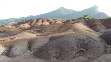 A stunning mountain range with rugged peaks and valleys, showcasing natural beauty and vastness.