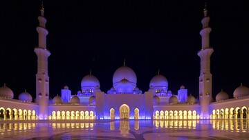 Sheikh Zayed Grand Mosque featuring intricate designs and beautiful white marble.